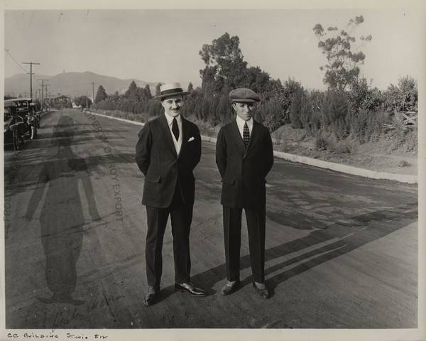 Brothers Sydney and Charles Chaplin at the future site of Chaplin Studios, Hollywood, 1917